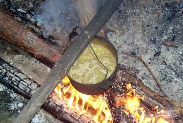 Pea soup cooked over a campfire