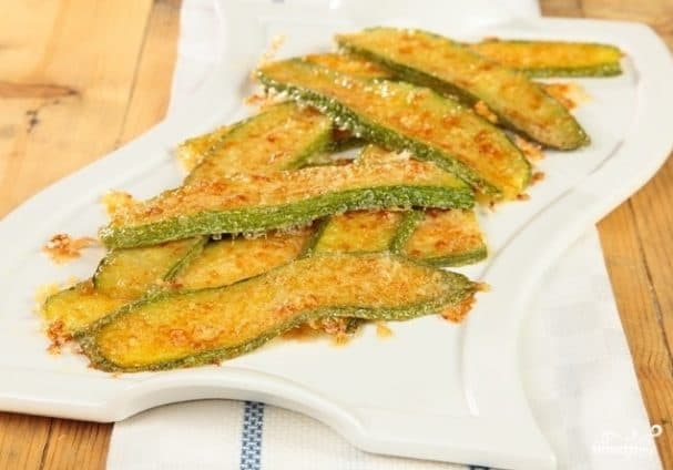 Zucchini with cheese topping