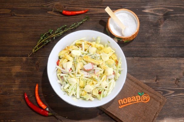 Crab salad with egg pancakes