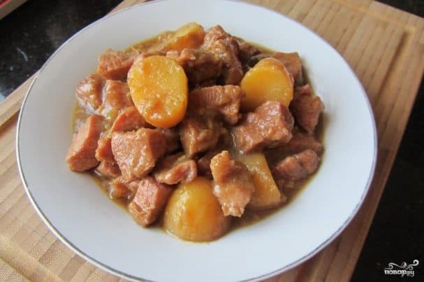 Meat with potatoes in foil