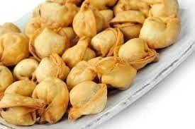 Пельмені на сковороді