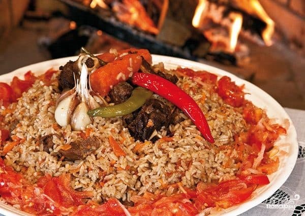 Uzbek-style plov in a cauldron