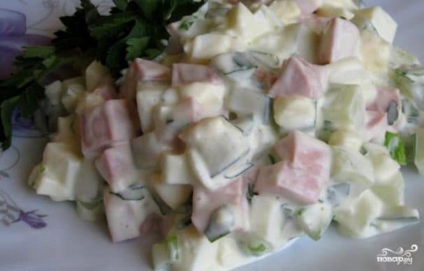 Salad with sausages and eggs