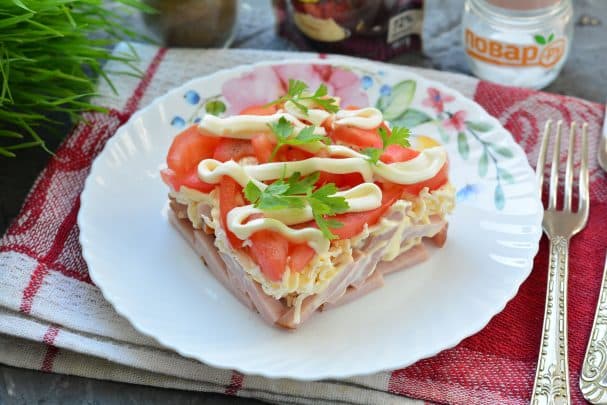 Layered salad with processed cheese