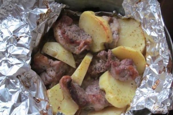Pork with potatoes in foil