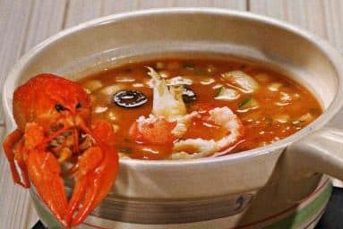 Tomato soup with crayfish tails