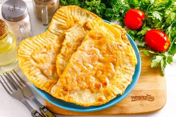 Chebureki with tomatoes