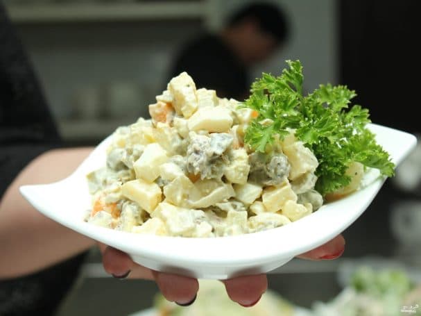 Olivier salad with pork