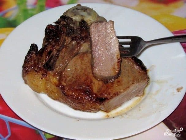 Beef ribeye steak in the oven