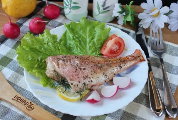 Sea bass baked in the oven with lemon