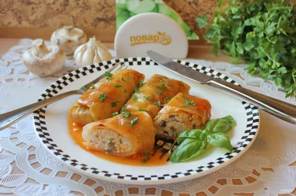 Cabbage rolls with meat, rice, and mushrooms