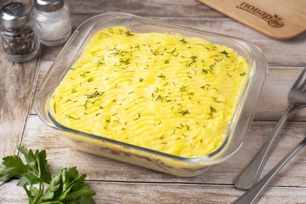 Potato casserole with sausages and mushrooms