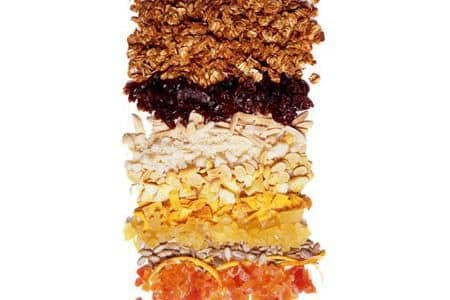 Granola with pineapple, papaya, and sunflower seeds