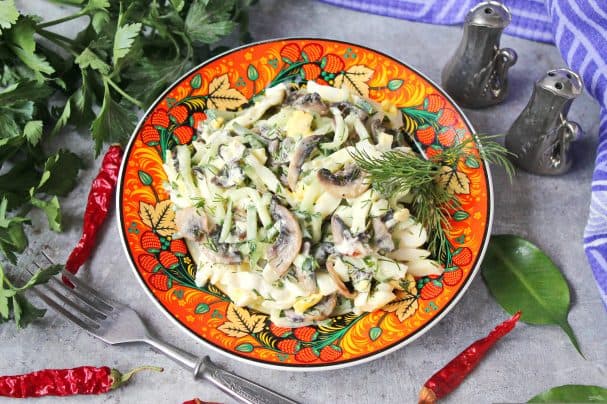 Mushroom salad with squid and cucumber