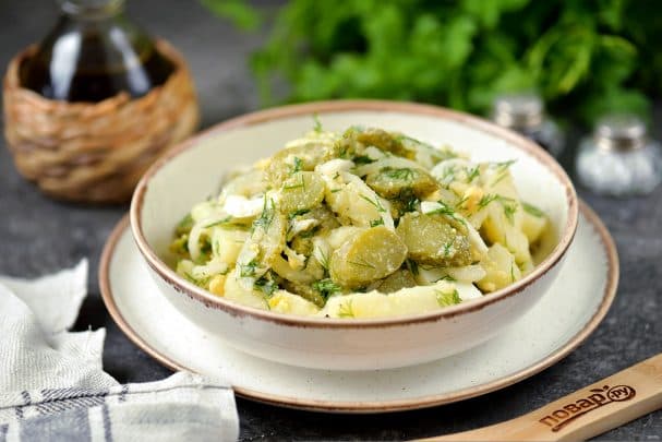 Potato salad with pickled cucumbers and onions