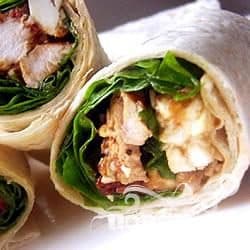 Roll with chicken, feta cheese, and sun-dried tomatoes