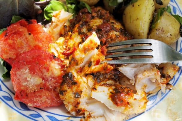 Fish with potatoes in the oven