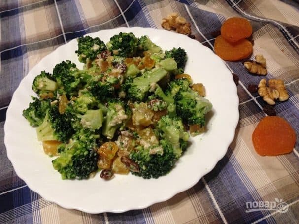 Broccoli salad with dried apricots, raisins, and nuts