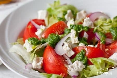 Tomato salad with feta and basil dressing