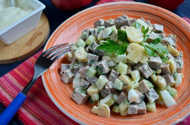 Salad with beef tongue and mushrooms