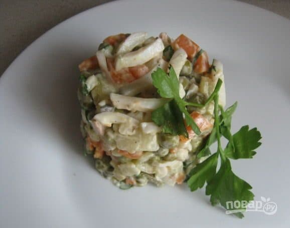 Salad with squid and pickled cucumber