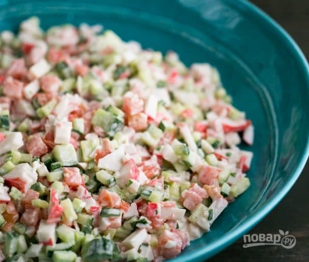 Salad with crab sticks and cucumber