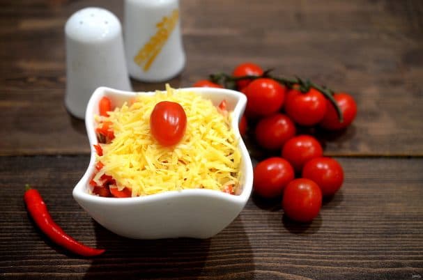 Salad with crab sticks and tomatoes