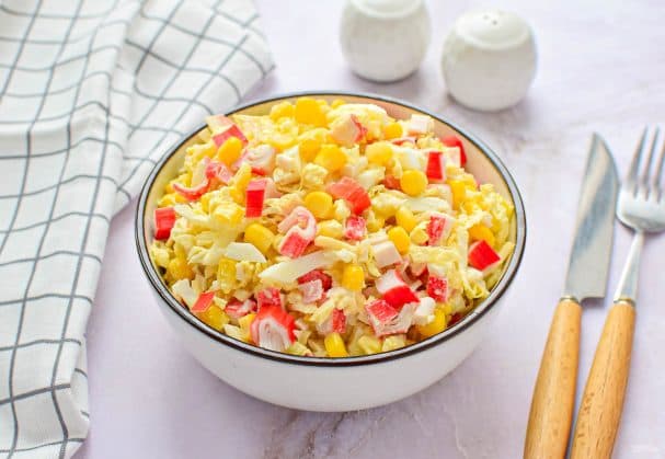 Salad with crab sticks, Chinese cabbage, and cheese