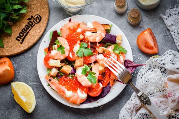 Salad with red caviar