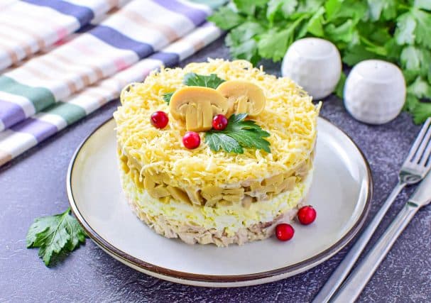 Chicken, cheese, and marinated mushrooms salad