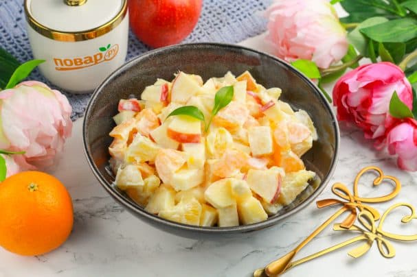 Salad with tangerine, apple, and orange