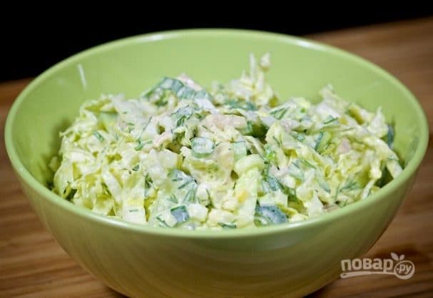 Salad with boiled chicken, egg, and vegetables
