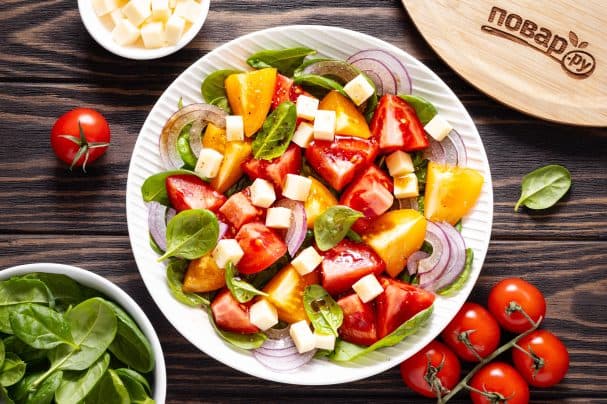 Salad with tomato, cheese, and soy sauce