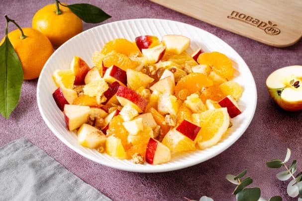 Salad with apple, orange, and tangerine