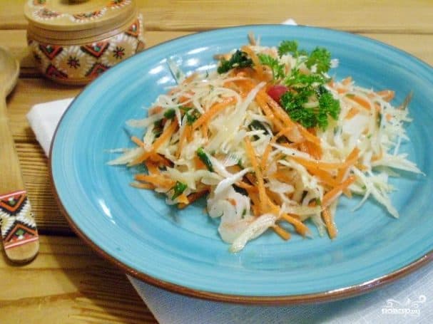 Vitamin-rich salad made with cabbage and carrots with vinegar