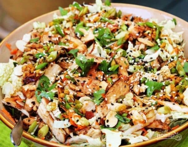 Thai-style warm salad with chicken fillet