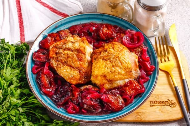 Chicken with plums baked in the oven