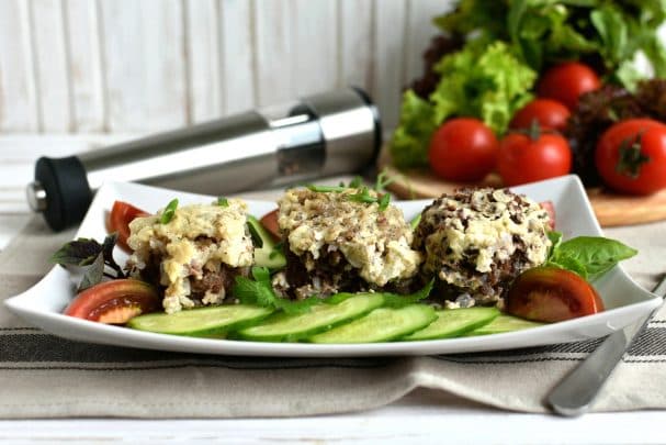 Colorful hedgehogs in sour cream sauce